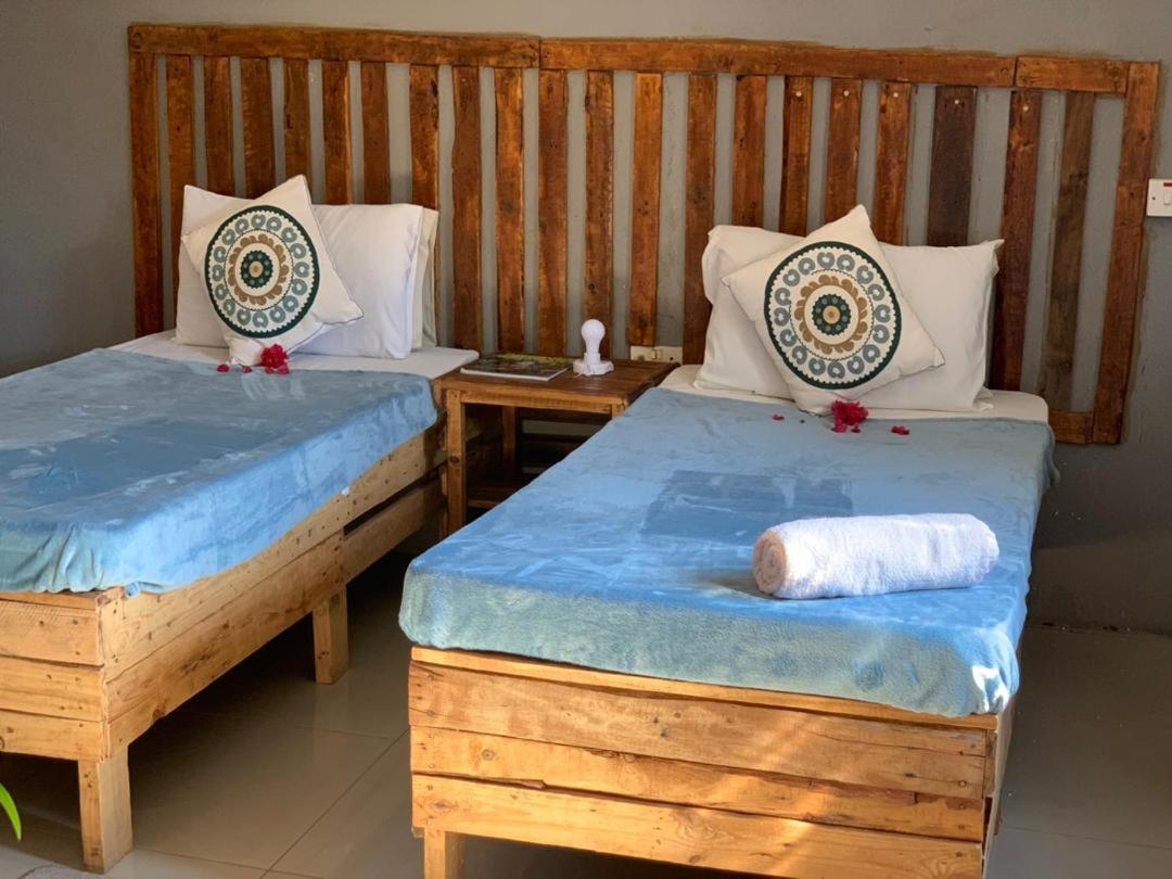 Jungle Breeze Home Stay كاسان المظهر الخارجي الصورة